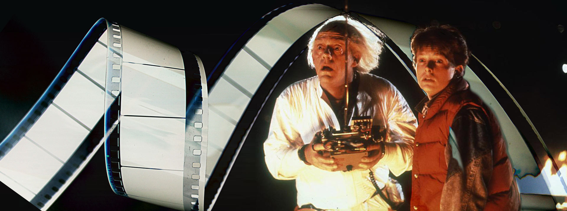 Dr. Emmet Brown and Marty McFly in Back To the Future with Film Reel flowing around them