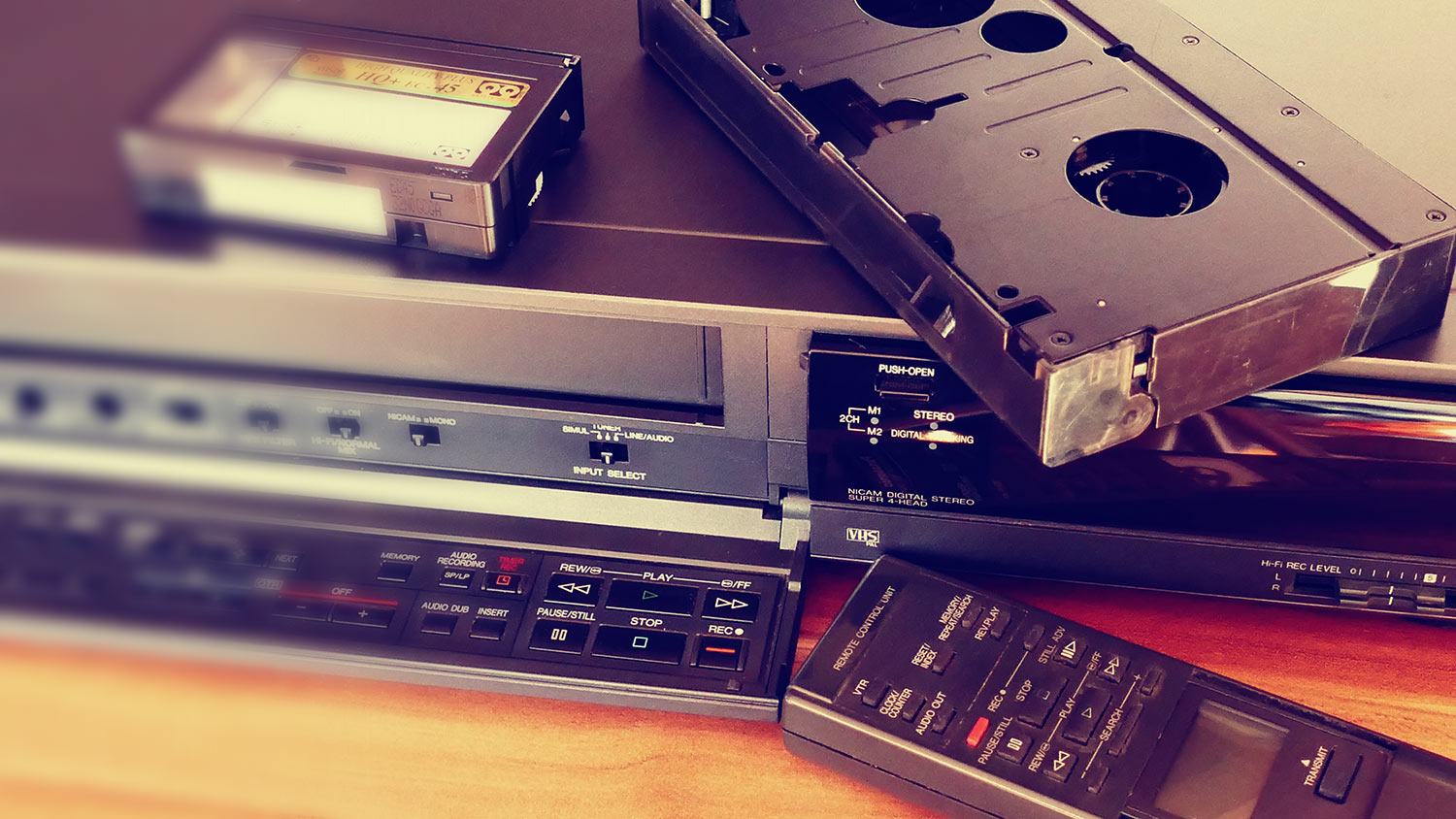 VHS Player with Tapes and Remote